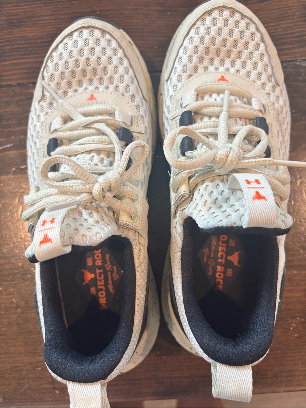 Under Armour Beige Mesh Sneakers with Black Collar and Orange Logos